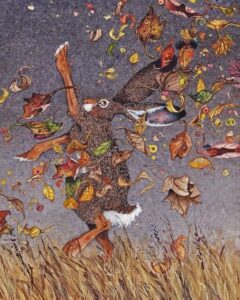 A whimsical illustration of a rabbit standing upright in tall grass, surrounded by swirling autumn leaves, acorns, and mushrooms against a grayish background captures the joyful spirit of Fall in Bigfork. The rabbit appears immersed in the swirling foliage.