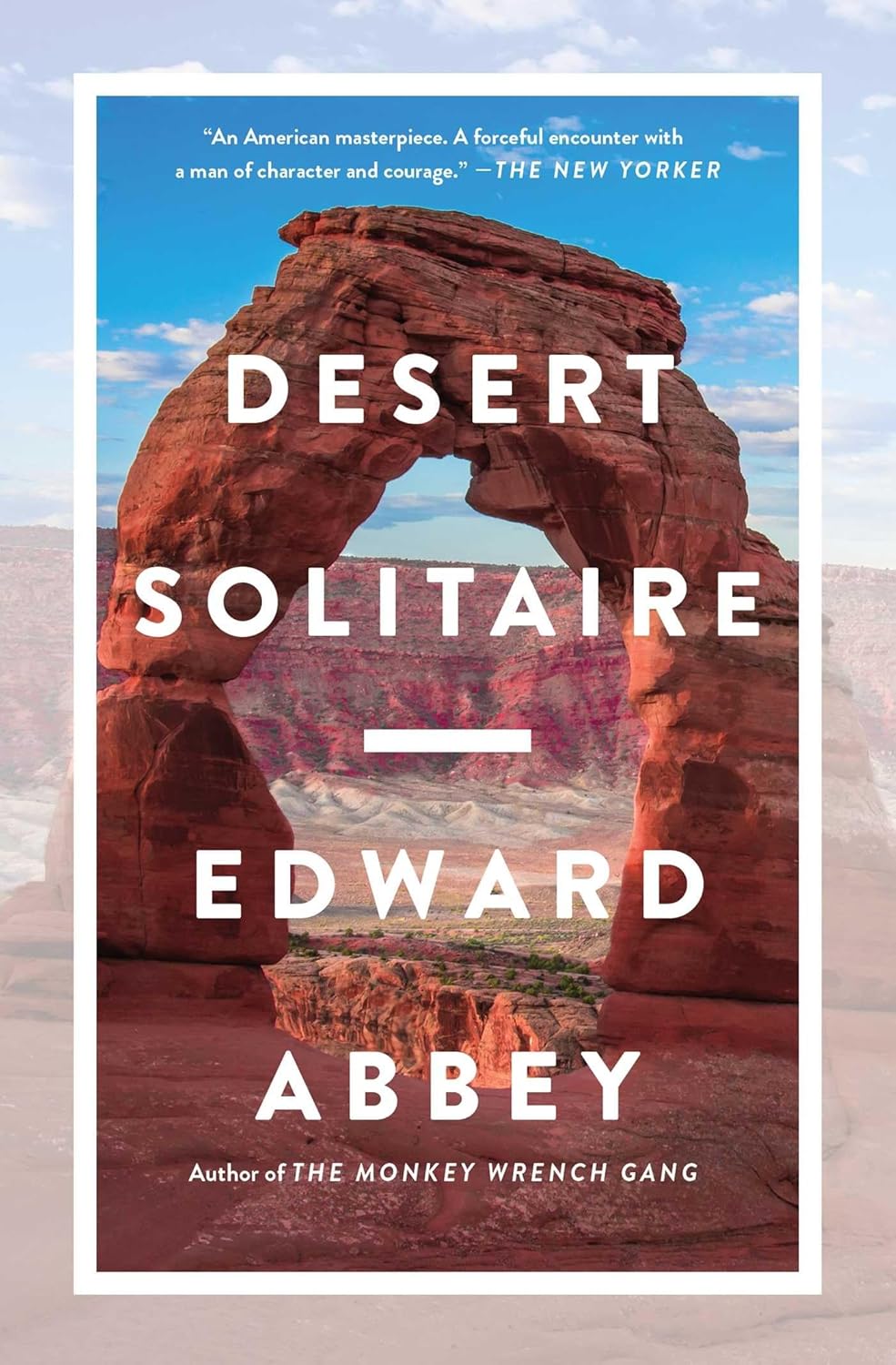 The cover of Desert Solitaire by Edward Abbey features large white text over a red rock arch in a desert landscape, perfectly capturing the spirit of August Reflections, with a quote from The New Yorker at the top and author info at the bottom.