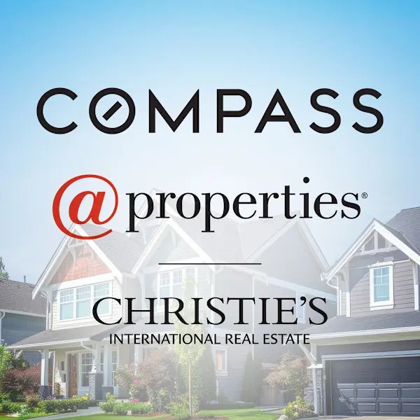 A promotional image featuring the logos of Compass, @properties, and Christies International Real Estate overlaid on suburban homes under a blue sky, celebrating a Merry Christmas and wishing you a prosperous New Year.