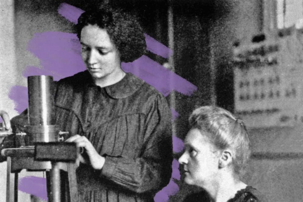 Two women in early 20th-century clothing work with scientific equipment; one stands adjusting a device, while the other sits and observes. Purple brushstroke accents in the background evoke an autumn atmosphere, perfect for an October update.