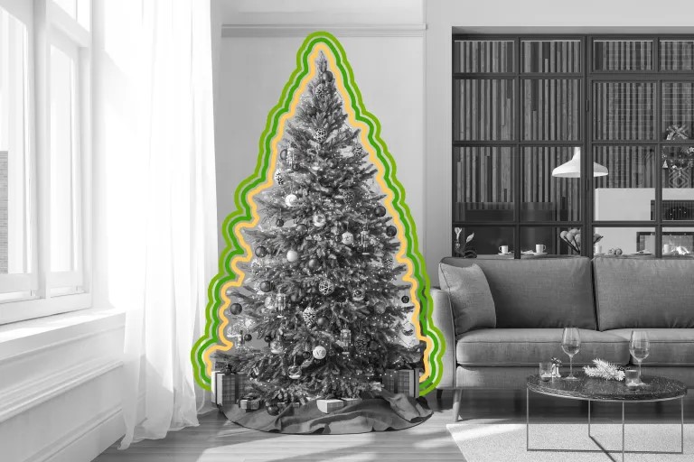 A decorated Christmas tree stands next to a sofa in a bright living room. Outlined with green and yellow lines, the black and white image features presents underneath and adds a touch of Merry Christmas cheer, perfect for the New Year season.