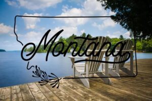 Two Adirondack chairs sit on a wooden dock overlooking a calm lake, inviting August Reflections beneath the blue sky. The word Montana is written in script inside an outline of the state, framed by tranquil trees.